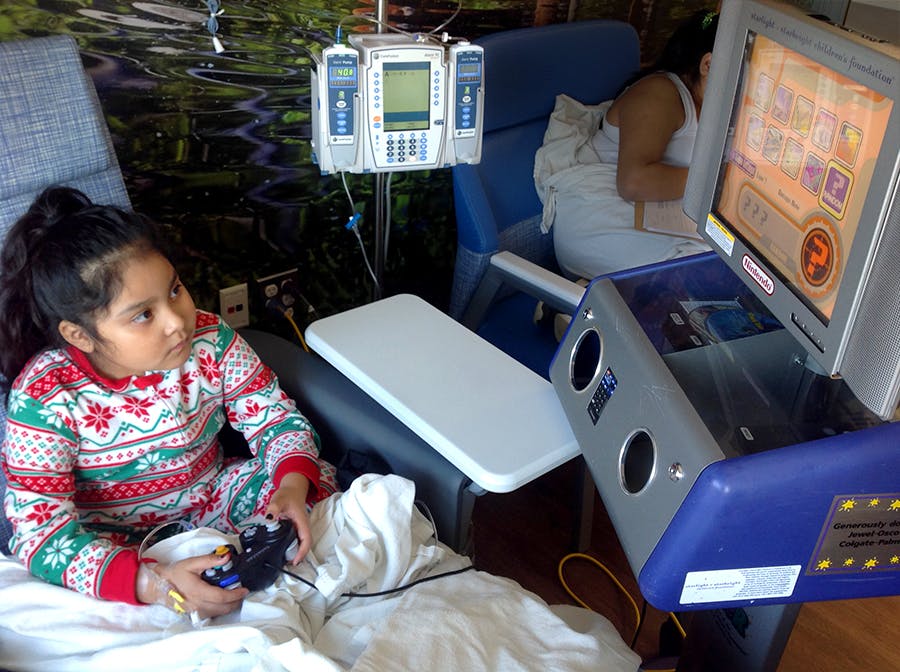 Chicagoland Children’s patient, 8-year-old Yaritza, using the gaming station